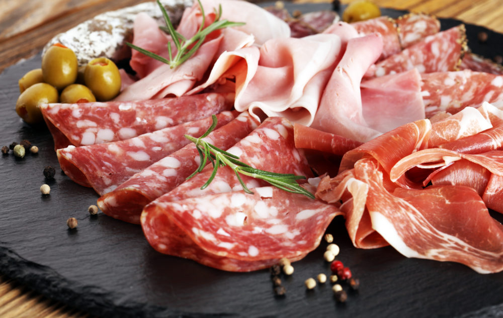 Marble,Cutting,Board,With,Prosciutto,,Bacon,,Salami,And,Sausages,On